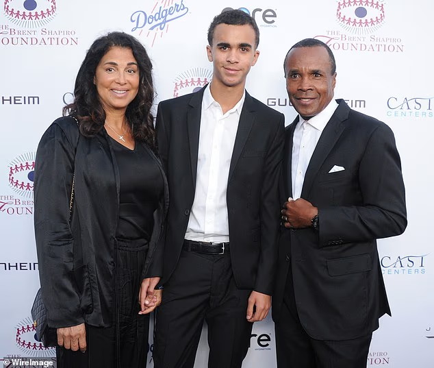 108762777-15854015-Daniel_Ray_Leonard_is_pictured_with_his_dad_Sugar_Ray_and_mom.jpg